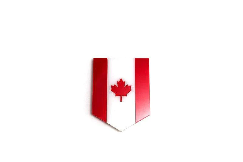 Radiator grille emblem with Canada logo